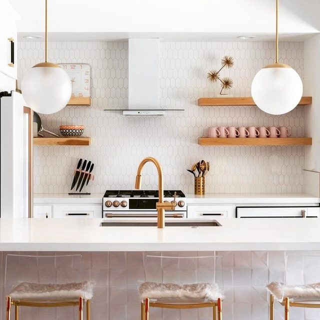 Tile backsplash: white tile wall with floating shelves